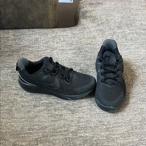 Never worn boys Nike shoes